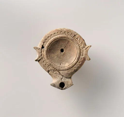 Terracotta oil lamp