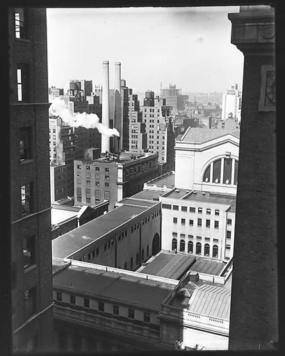[Cityscape with West 31st Street Buildings and Smokestacks, New York City]
