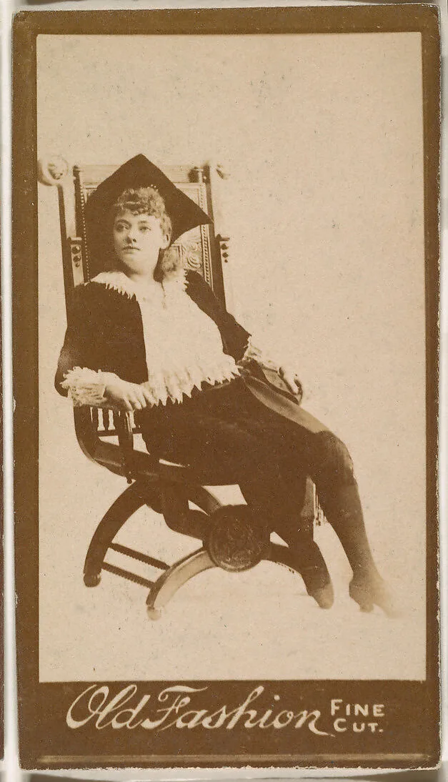 Actress seated in chair, from the Actresses series (N664) promoting Old Fashion Fine Cut Tobacco — Unknown