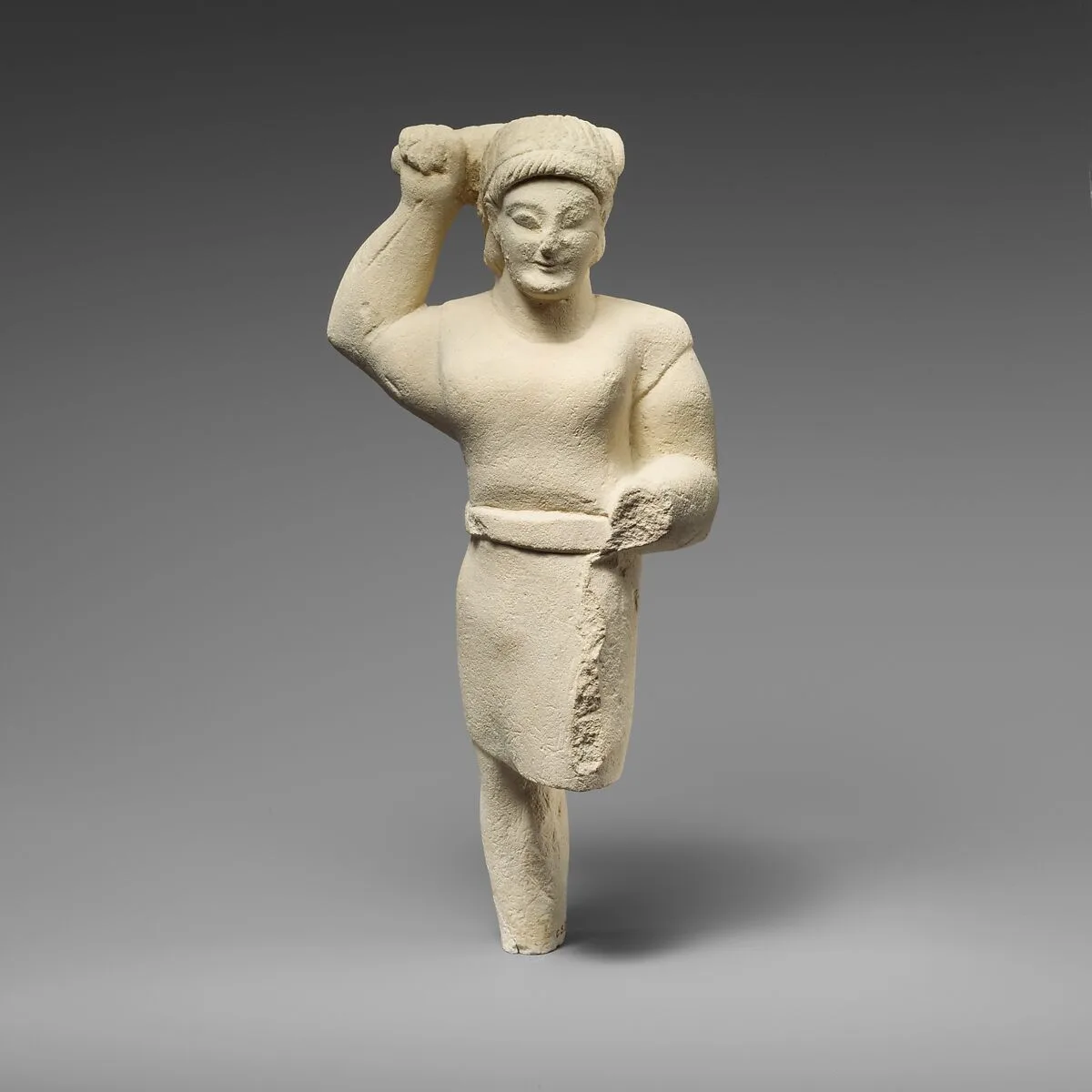 Limestone statuette of Herakles brandishing a club — Unknown