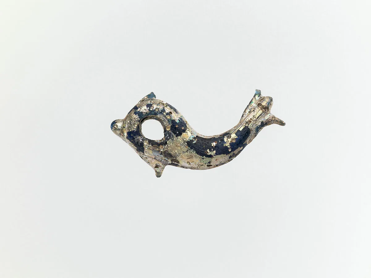 Glass pendant in the form of a dolphin — Unknown