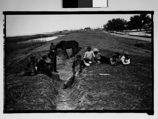 [Children on Levee, From Automobile, New Orleans Vicinity, Louisiana]