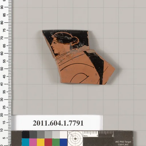 Terracotta rim fragment of a kylix (drinking cup)