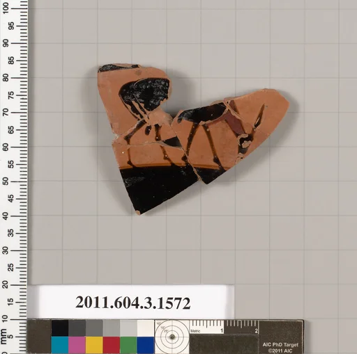 Terracotta fragment of a kylix: Band cup (drinking cup)