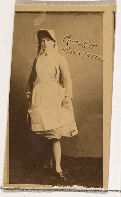 Unknown actress in white cap and apron, from the Actors and Actresses series (N145-1) issued by Duke Sons & Co. to promote Cross Cut Cigarettes — W. Duke, Sons & Co.