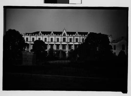 [Large Gothic Revival Building, From Moving Automobile, Convent Vicinity, Louisiana]
