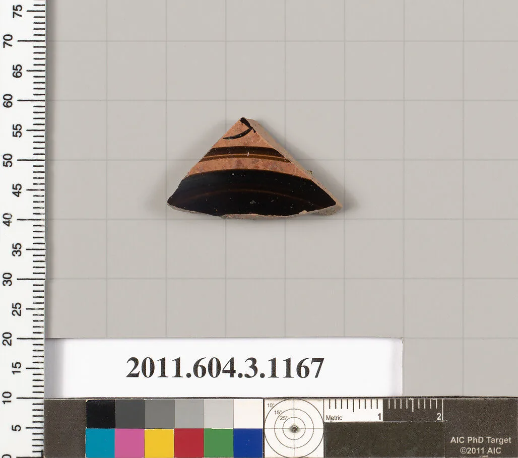 Terracotta fragment of a mastoid (drinking cup with narrow base) or a kyathos (cup-shaped ladle) — Unknown