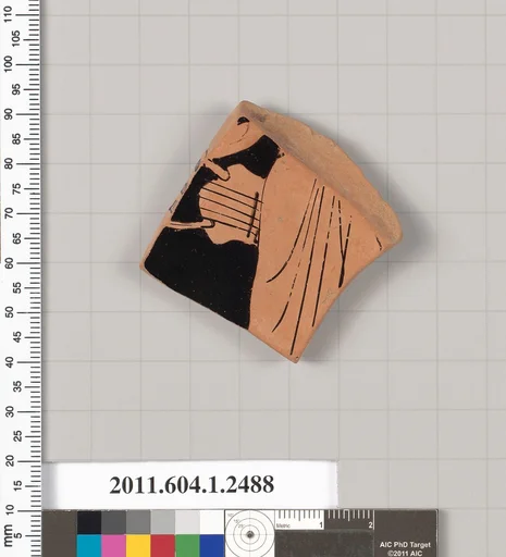 Terracotta fragment of a kylix (drinking cup)