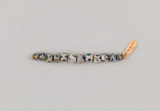 String of 12 Eyed Beads