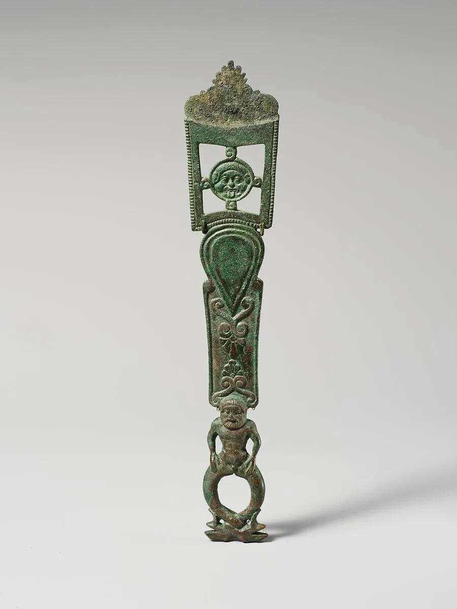 Bronze handle of a strainer — Unknown