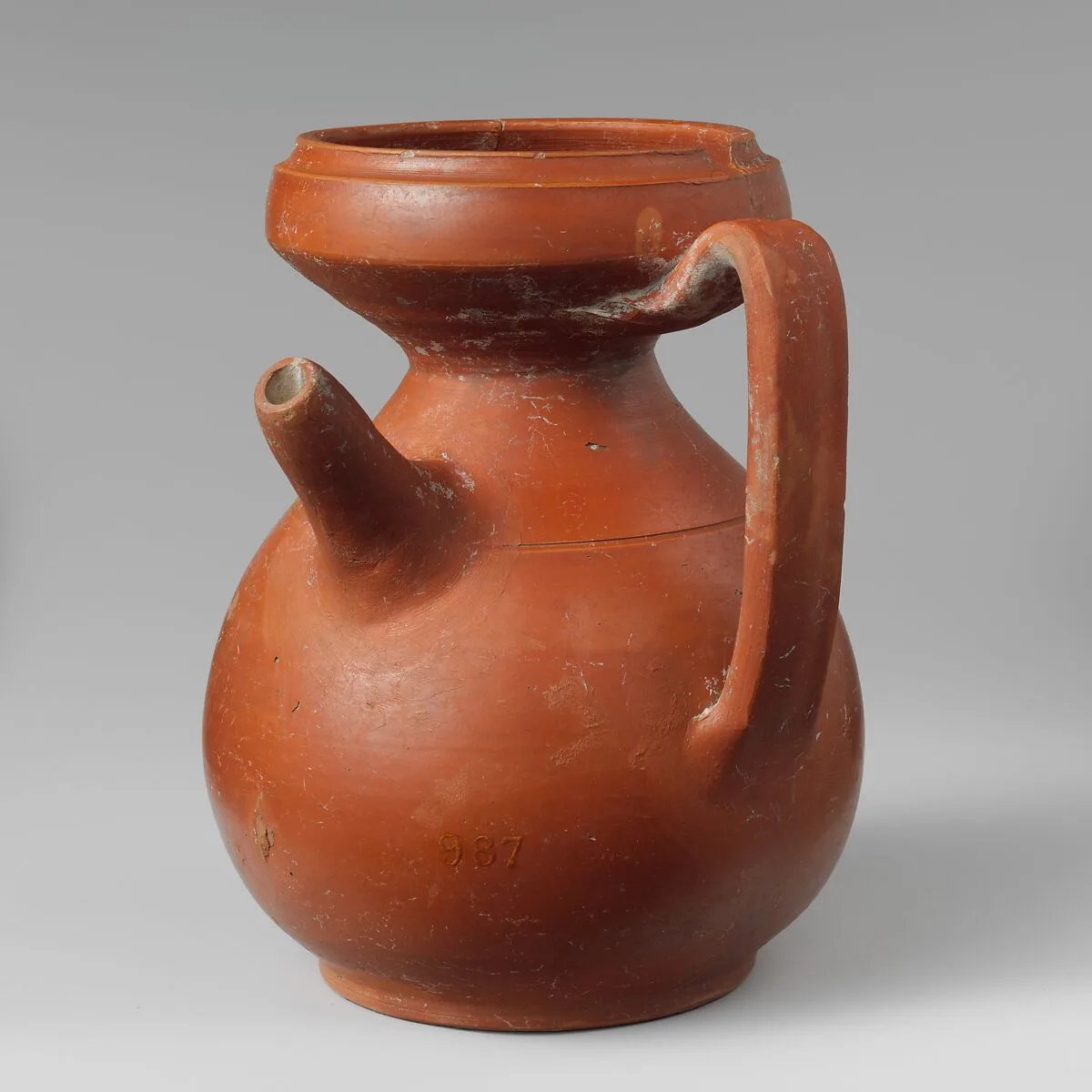Terracotta strainer jug — Unknown