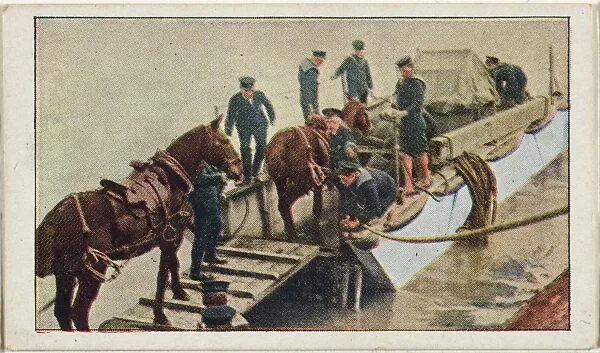Card No. 17, The English Navy Service Corps Embarking with Gun and Horses at South-Sea, England, from the World War I Scenes series (T121) issued by Sweet Caporal Cigarettes — American Tobacco Company|Underwood & Underwood
