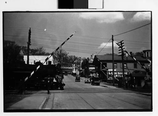 [Two 35mm Film Frames: Railroad Crossing on Main Street, Millerton, New York]