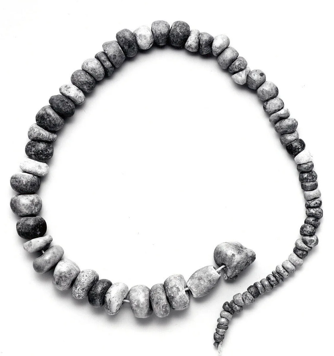 Necklace of stone beads — Unknown