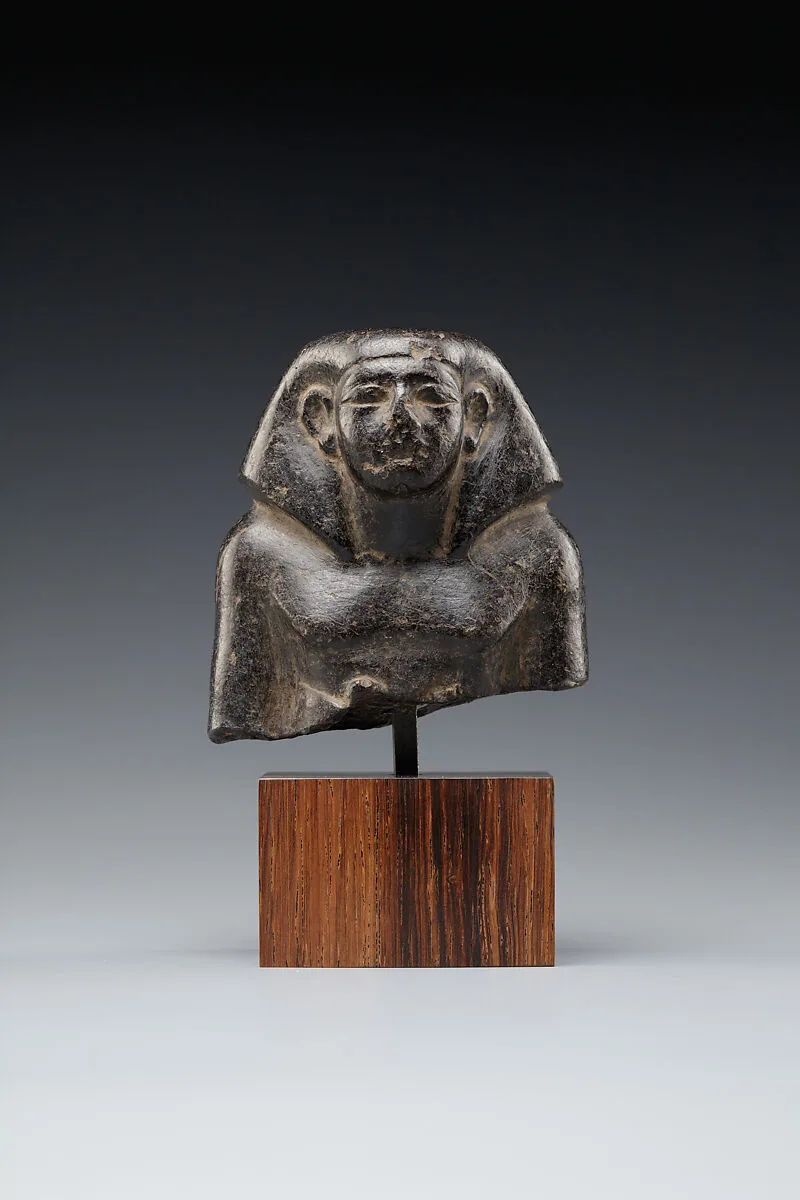 Head and Upper Torso of a Seated Official — Unknown