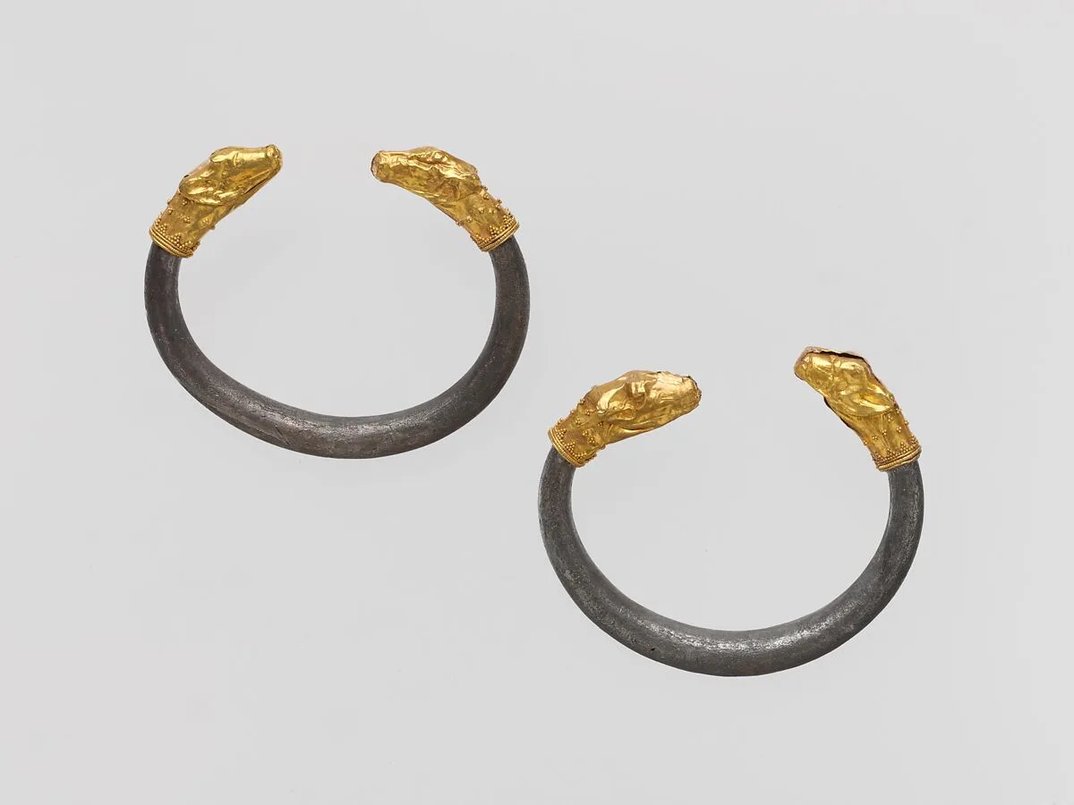 Silver bracelet with gold calf's head finial — Unknown