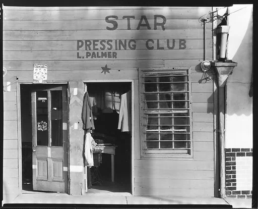 [Shopfront Façade of Star Pressing Club Laundry, Vicksburg, Mississippi]