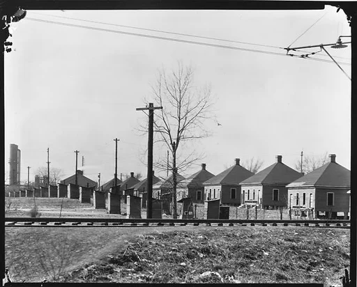 ["Company" Houses for Steel Mill Workers, Seen From Across Railroad Tracks, Birmingham, Alabama]
