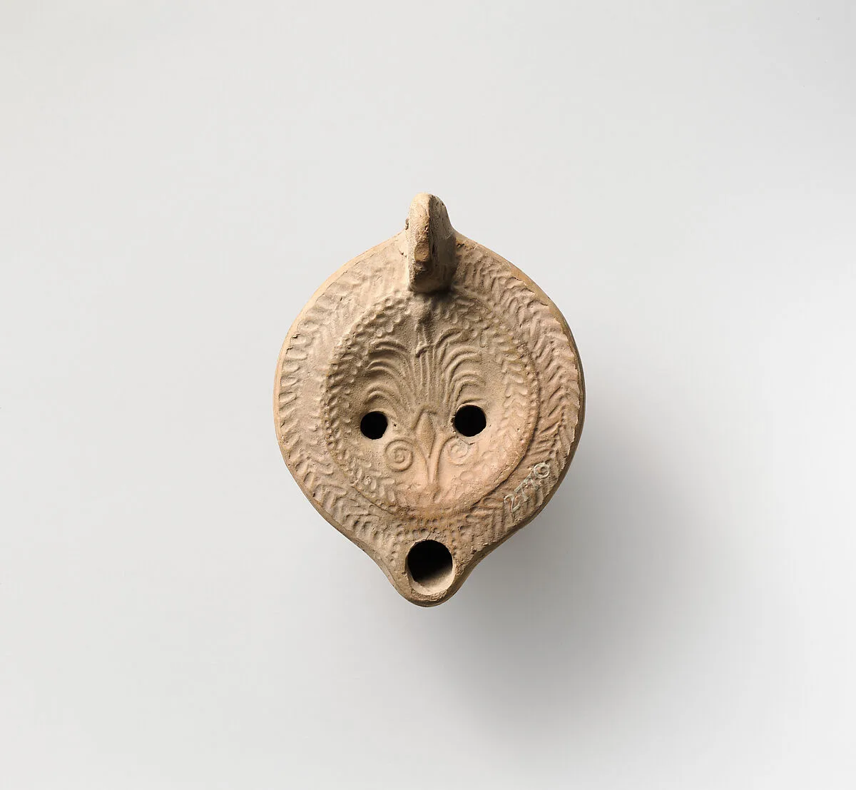 Terracotta oil lamp — Unknown