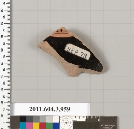 Terracotta fragment of a lekanis lid (covered dish)