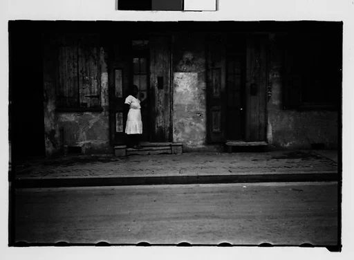 [Woman Standing in Doorway in French Quarter, New Orleans, Louisiana]