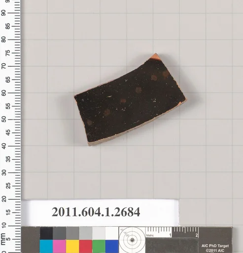 Terracotta fragment of a kylix (drinking cup)