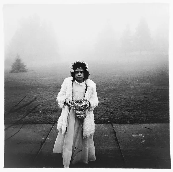 A flower girl at a wedding, Conn. — Neil Selkirk|Diane Arbus