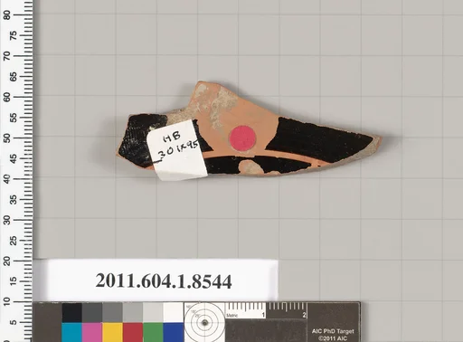 Terracotta fragment of a stemless kylix (drinking cup)