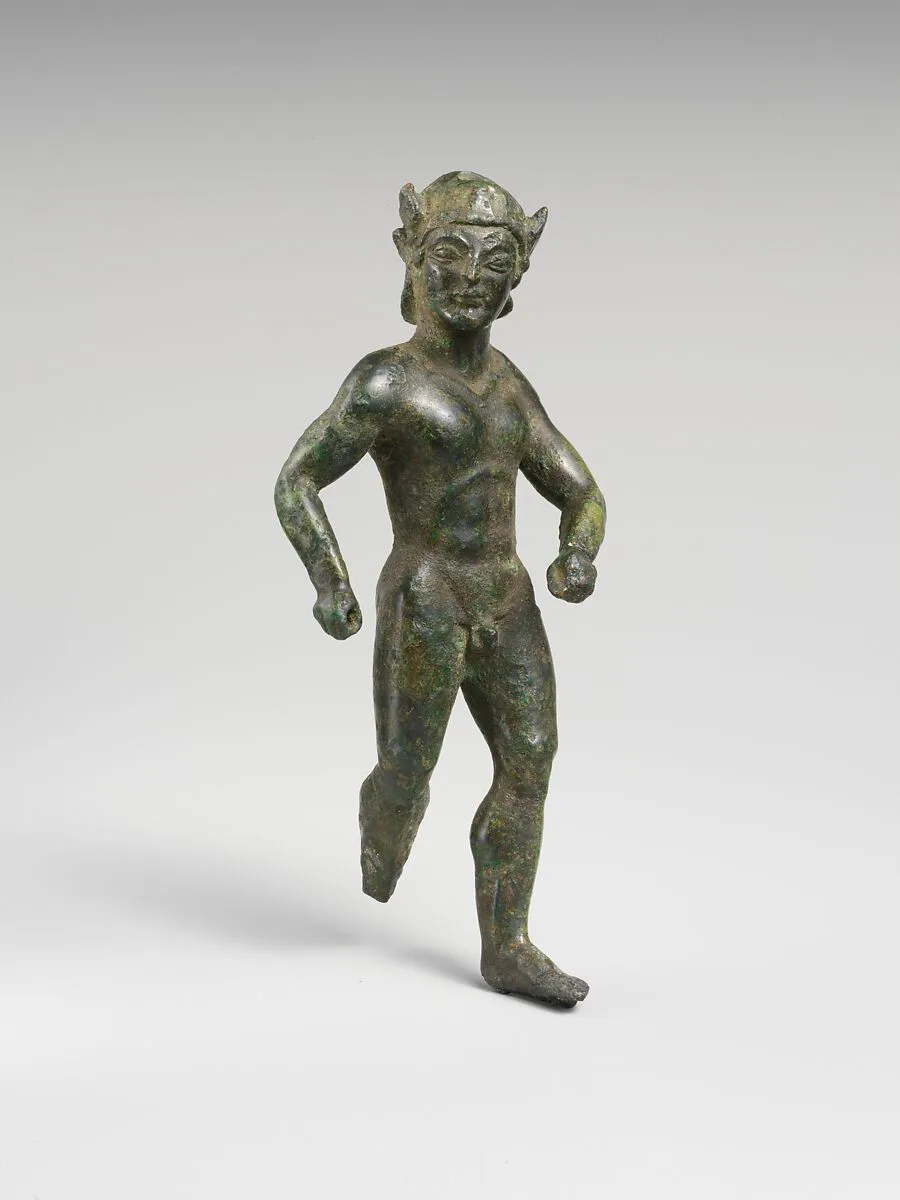 Bronze statuette of a striding warrior — Unknown