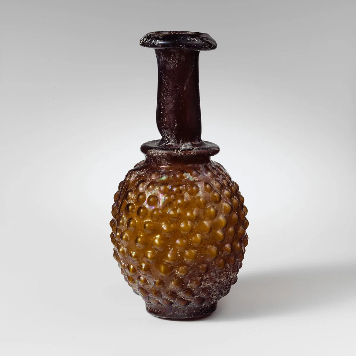 Glass bottle shaped like a bunch of grapes — Unknown