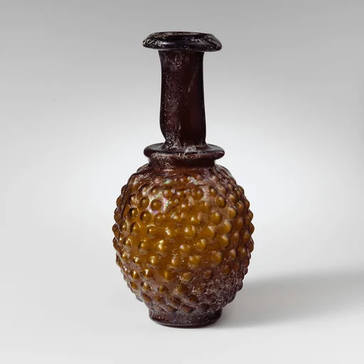 Glass bottle shaped like a bunch of grapes