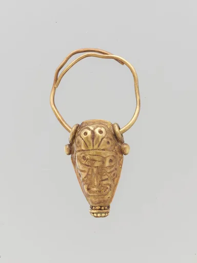 Gold earring with head of a bull