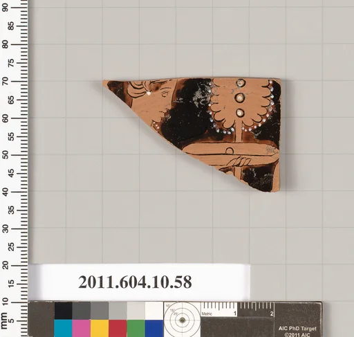 Terracotta fragment of a kylix (drinking cup)