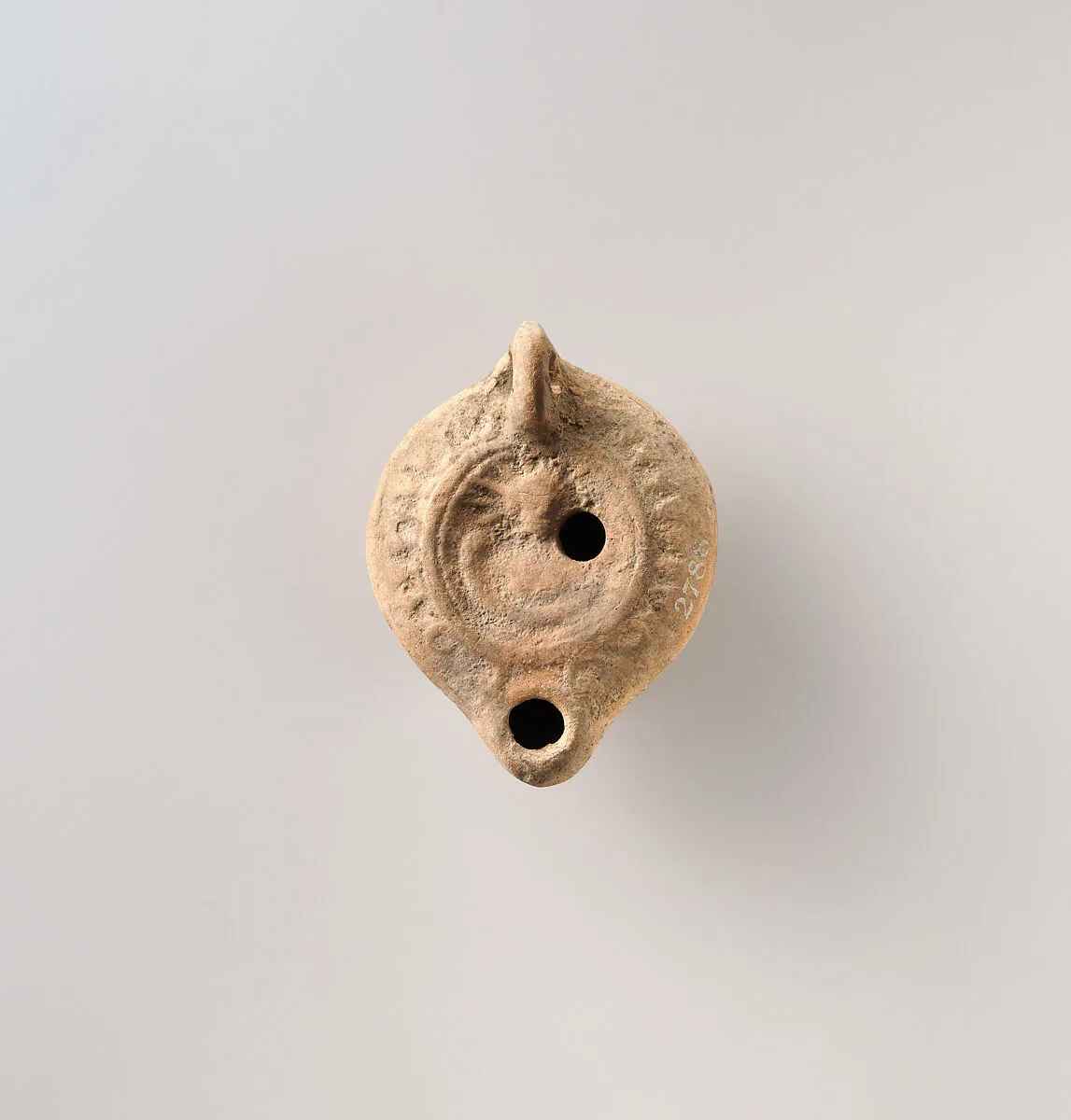 Terracotta oil lamp — Unknown