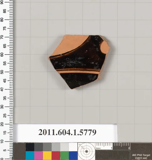 Terracotta fragment of a kylix: eye-cup (drinking cup)
