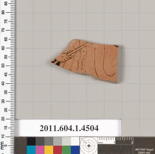 Terracotta fragment of a kylix (drinking cup)