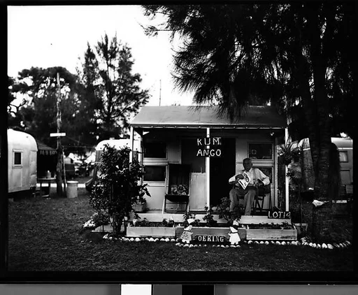 [House with Sign "KUM ANGO" in Municipal Trailer Camp, Sarasota?, Florida]