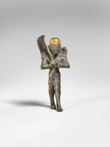 Winged deity