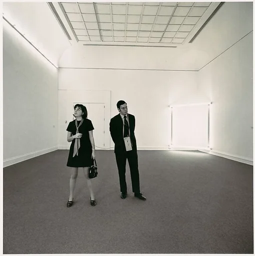 [Two Gallery-goers viewing Dan Flavin's work in the exhibition "New York Painting and Sculpture" at the Metropolitan Museum of Art]