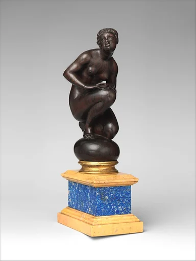 Crouching female nude