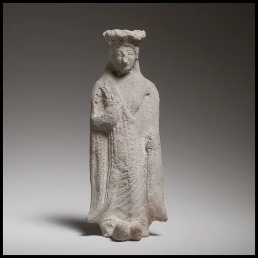 Terracotta statuette of a standing woman