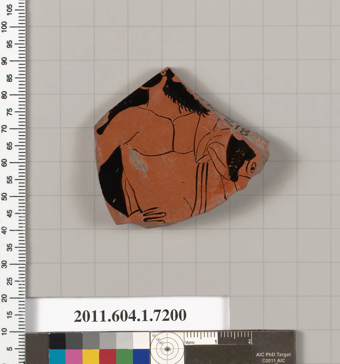 Terracotta fragment of a kylix (drinking cup) — Makron