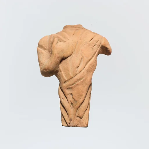 Terracotta statuette of a draped figure, probably female