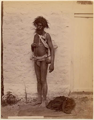 [Man in Loincloth with Strands of Beads]