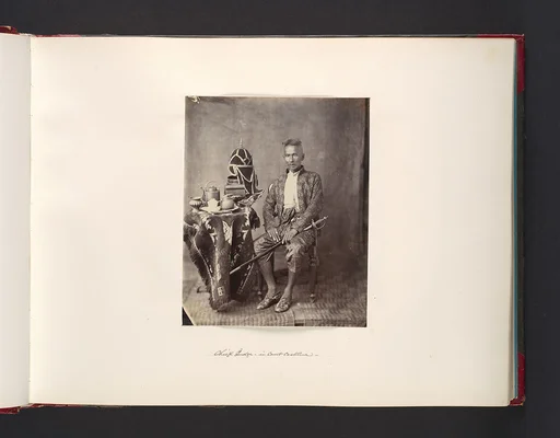 [Chief in Court Costume]