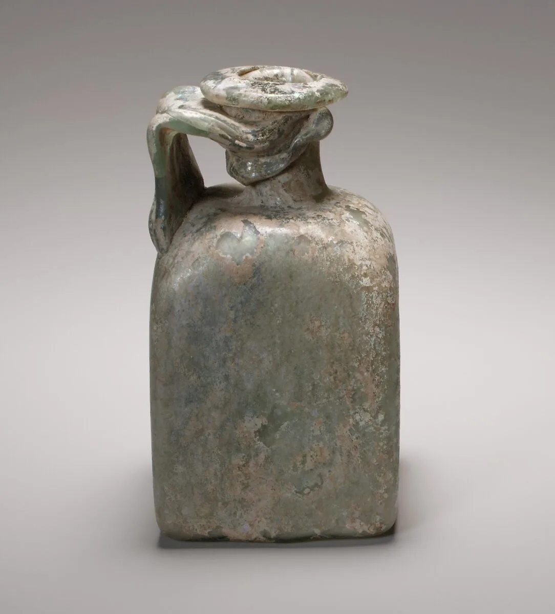 Glass square bottle — Unknown