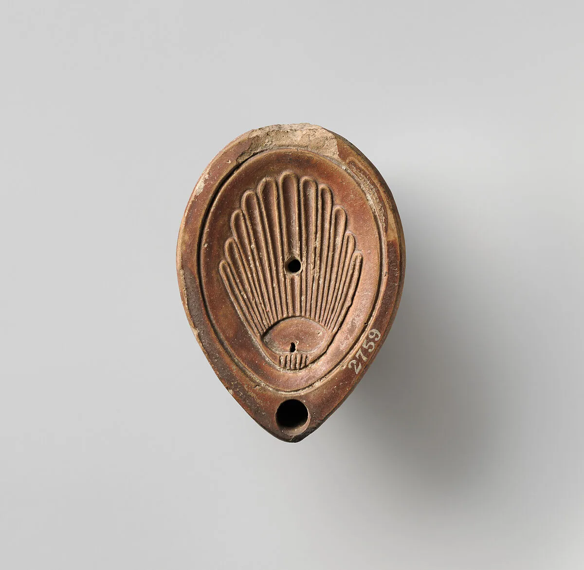 Terracotta oil lamp — Unknown