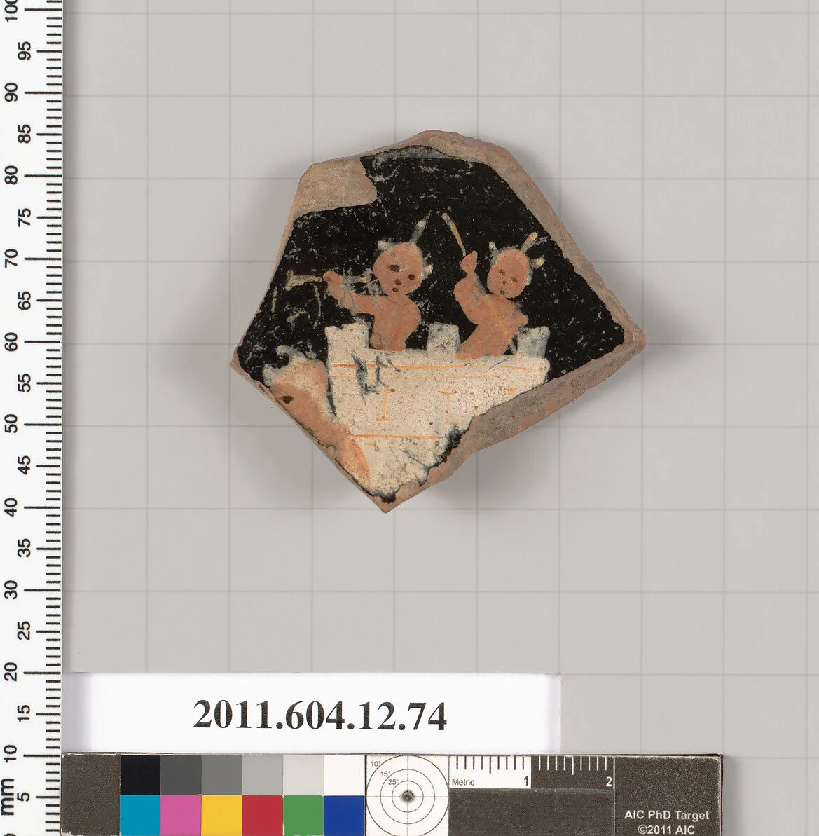 Terracotta fragment of a kylix (drinking cup)? — Unknown