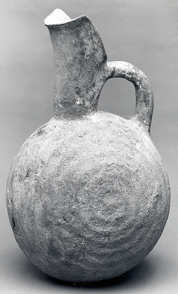 Spouted jug with raised concentric circles — Unknown