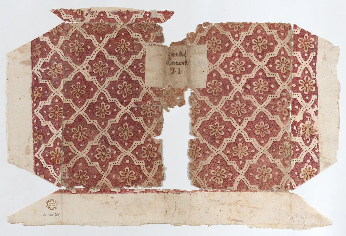 Book cover with red geometric and flower pattern — Anonymous